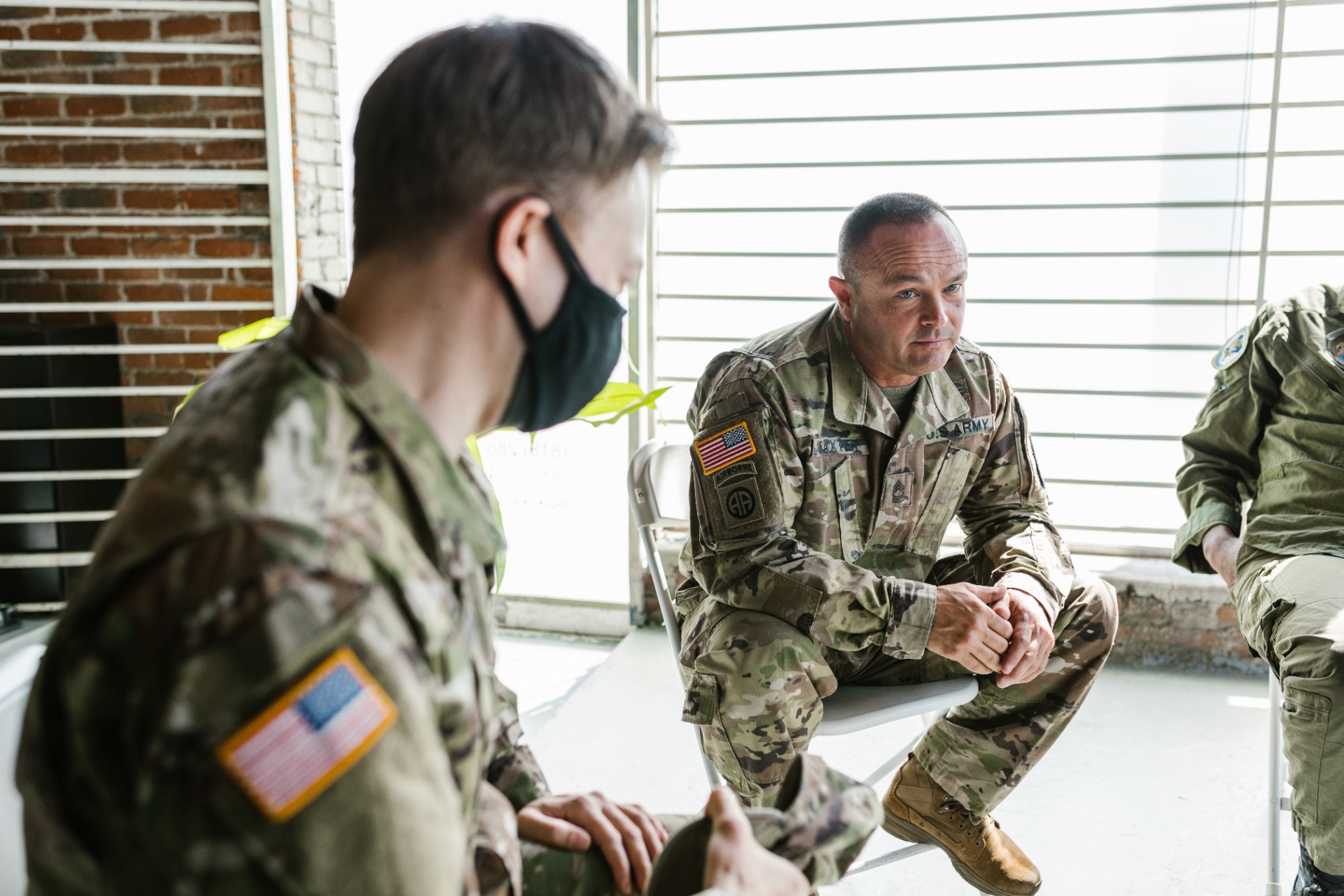 Veterans in a peer support session